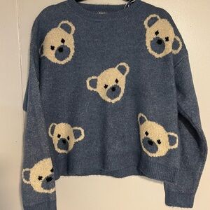 Cream and Blue Crew Neck Sweater with Playful Design
